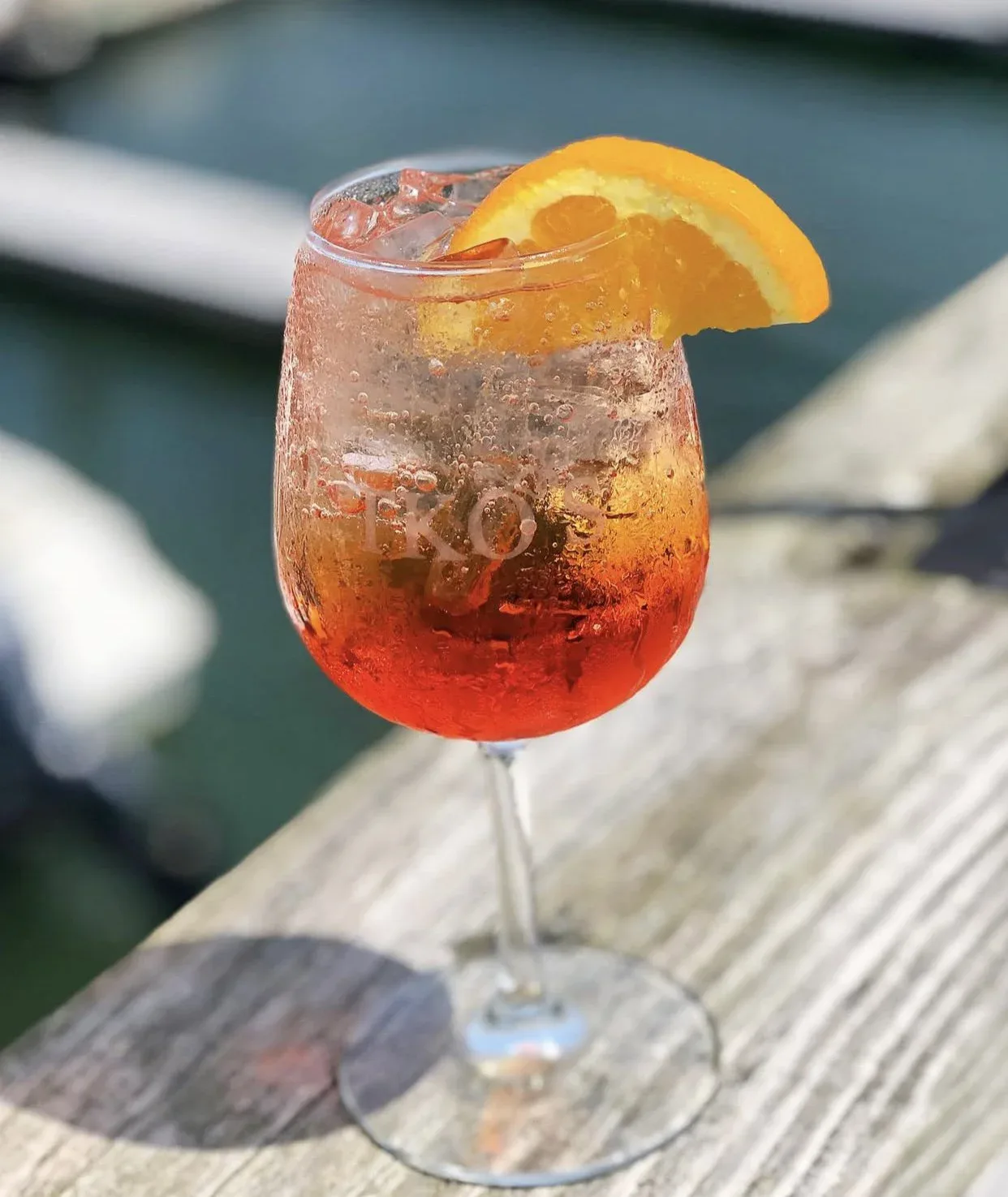 Aperol Spritz cocktail on the dock at TKO Malley's Scituate Harbor